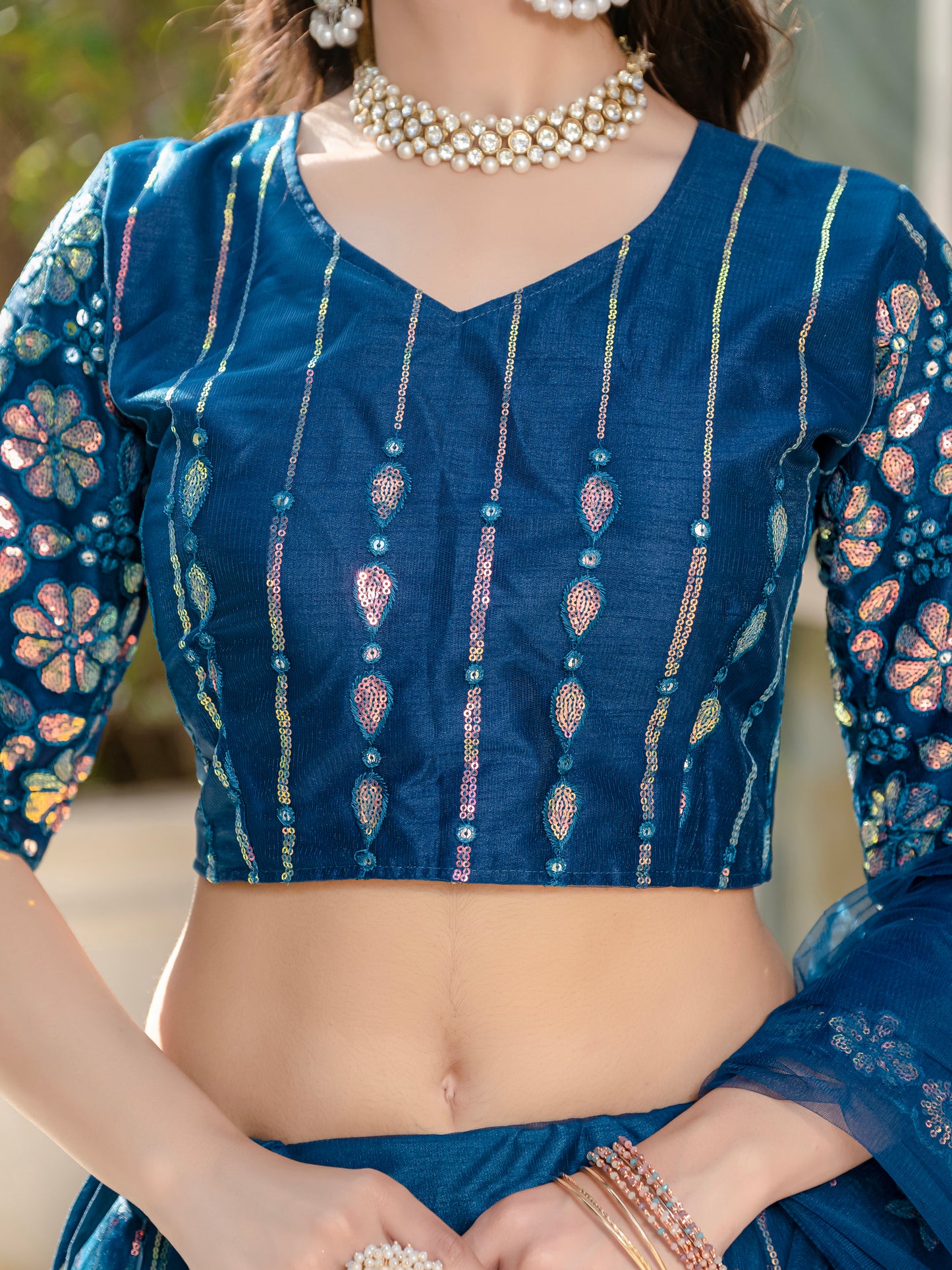 Exquisite Rama Blue Net Lehenga Choli with Sequin & Thread Embroidery