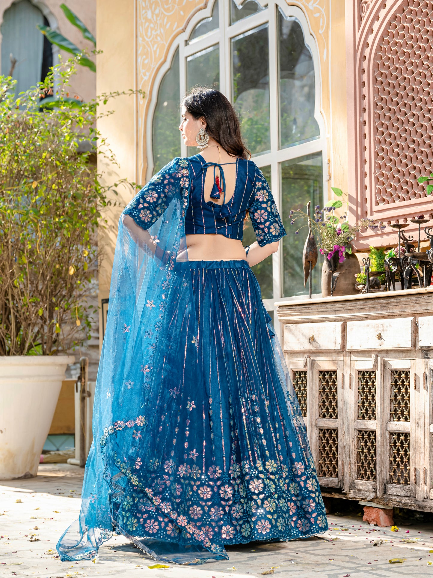 Exquisite Rama Blue Net Lehenga Choli with Sequin & Thread Embroidery