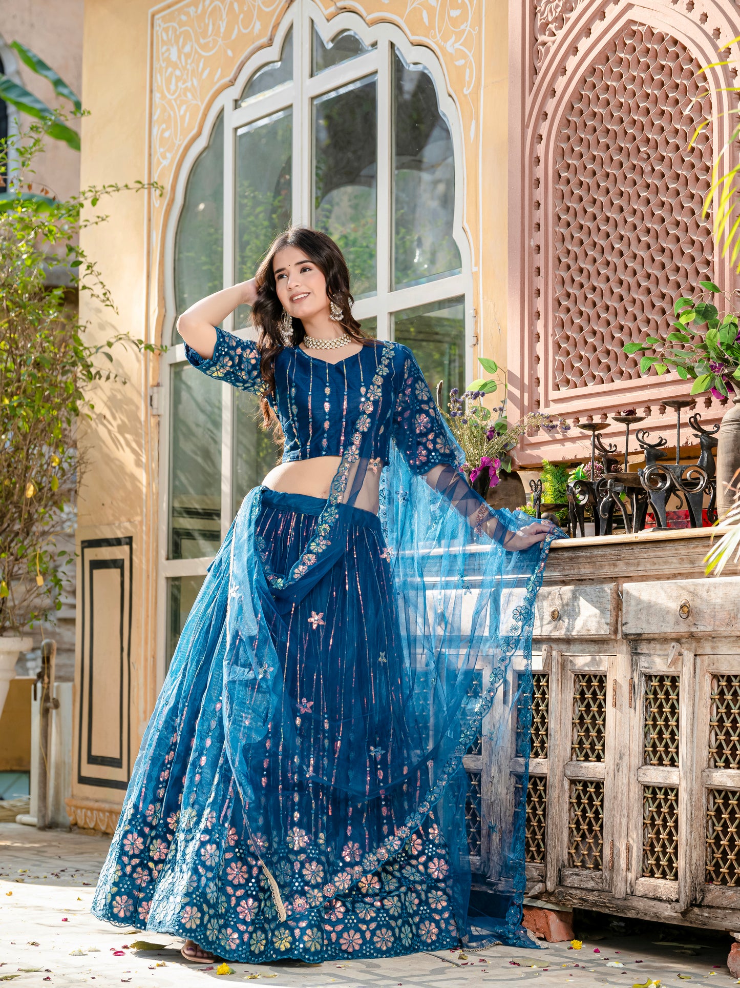 Exquisite Rama Blue Net Lehenga Choli with Sequin & Thread Embroidery