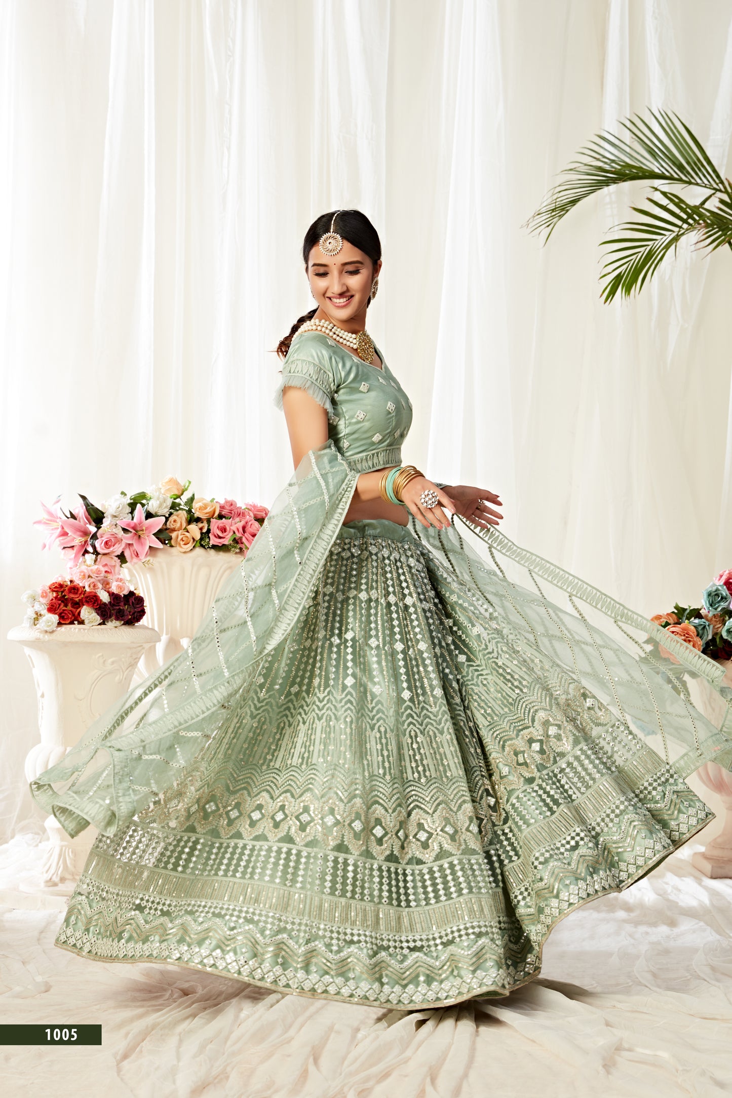 Heavy Designer Pista Green (Mint Green) Lehenga Choli with Sequins & Mirror Work