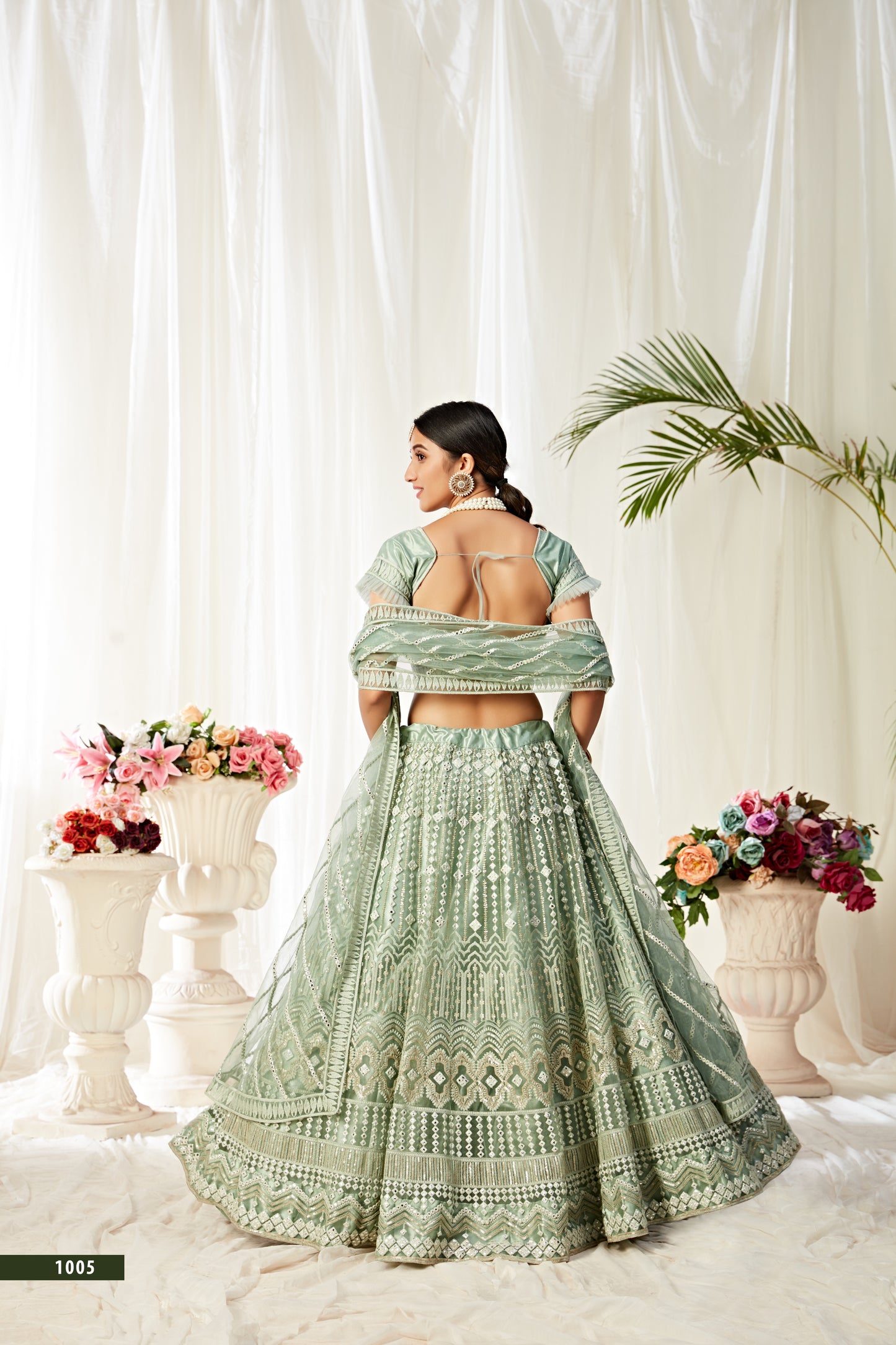 Heavy Designer Pista Green (Mint Green) Lehenga Choli with Sequins & Mirror Work