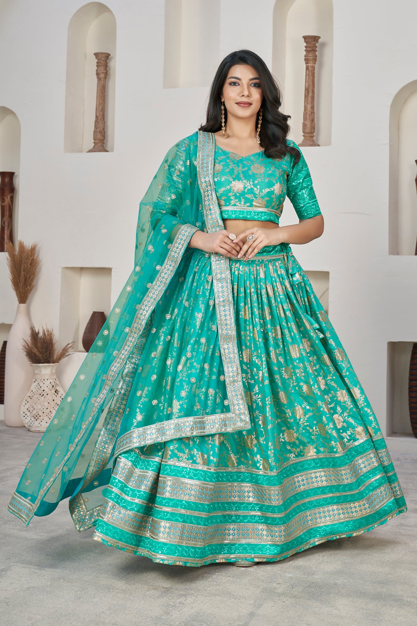 Elegant Cyan Green Dola Jacquard Lehenga with Zari & Sequin Work
