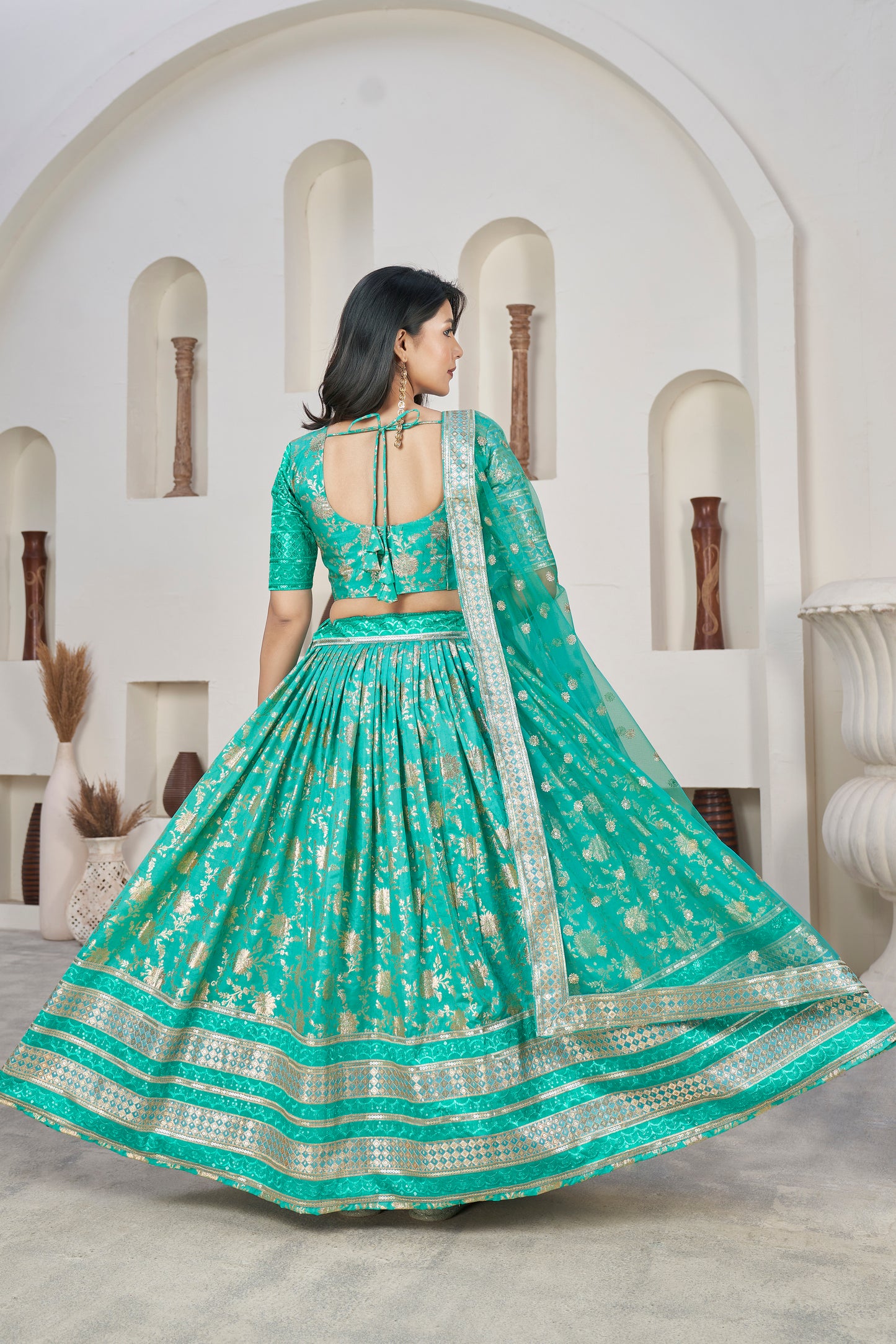 Elegant Cyan Green Dola Jacquard Lehenga with Zari & Sequin Work