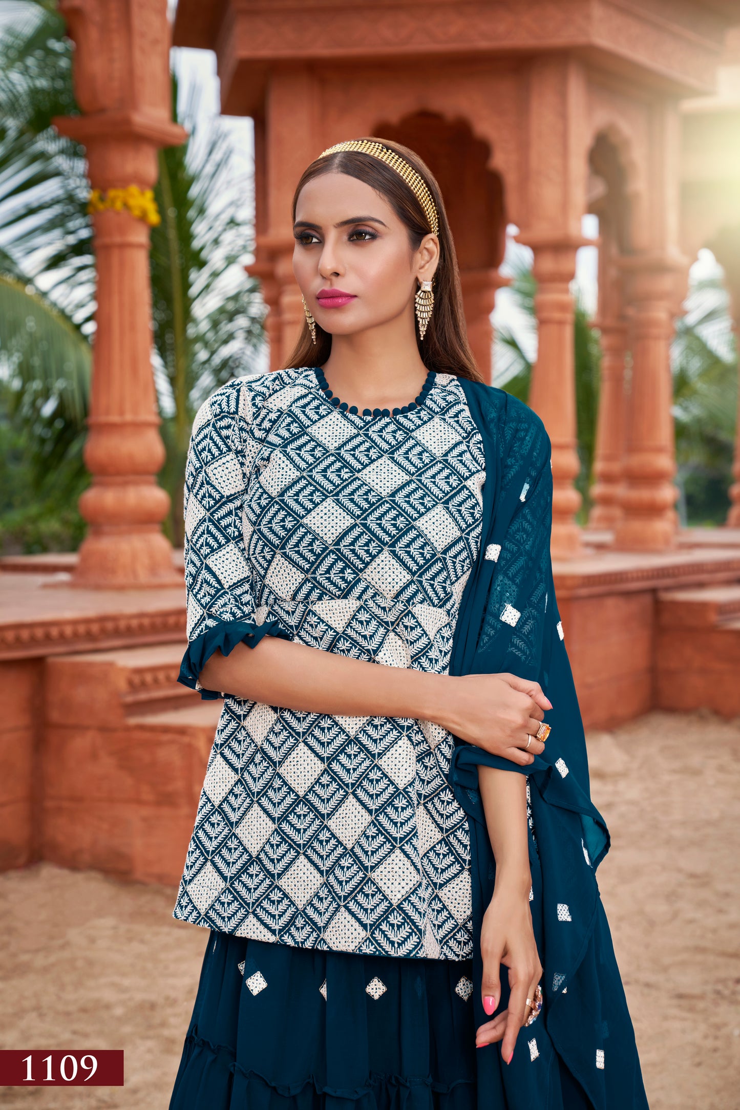 Elegant Teal Fox Georgette Suit with Intricate Cotton Embroidery