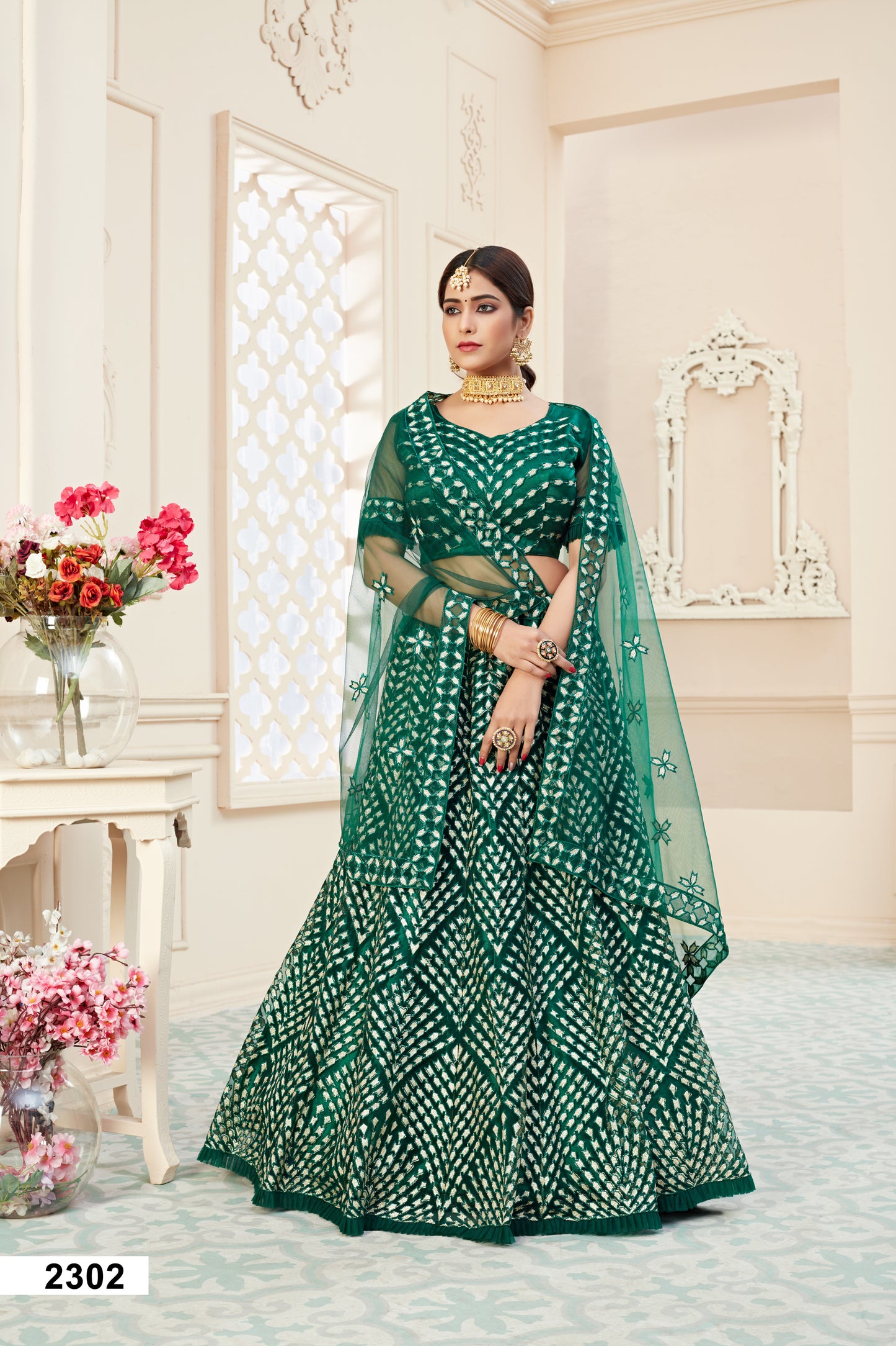 Elegant Green Soft Net Lehenga Choli with Badla Thread Work