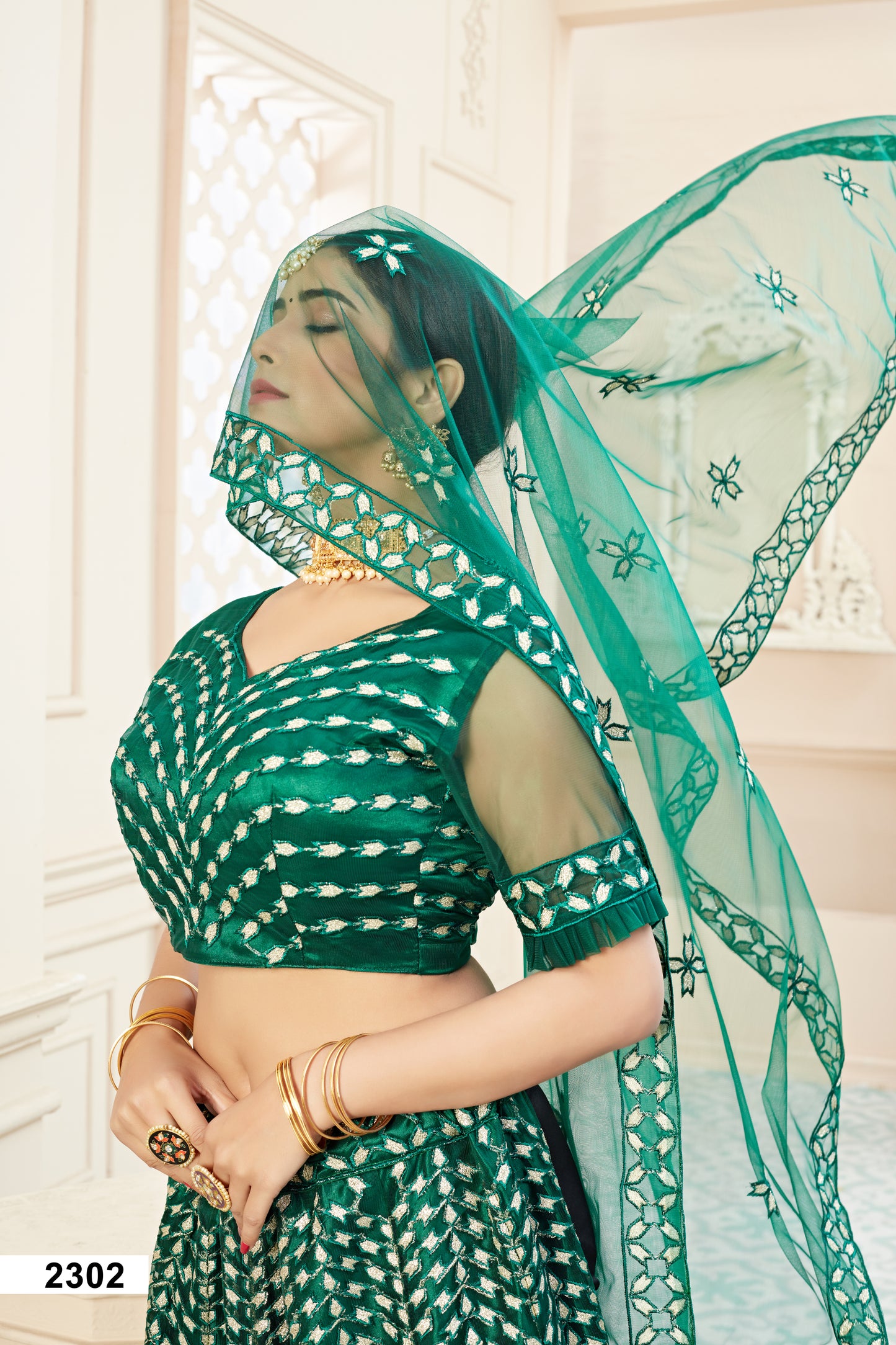 Elegant Green Soft Net Lehenga Choli with Badla Thread Work