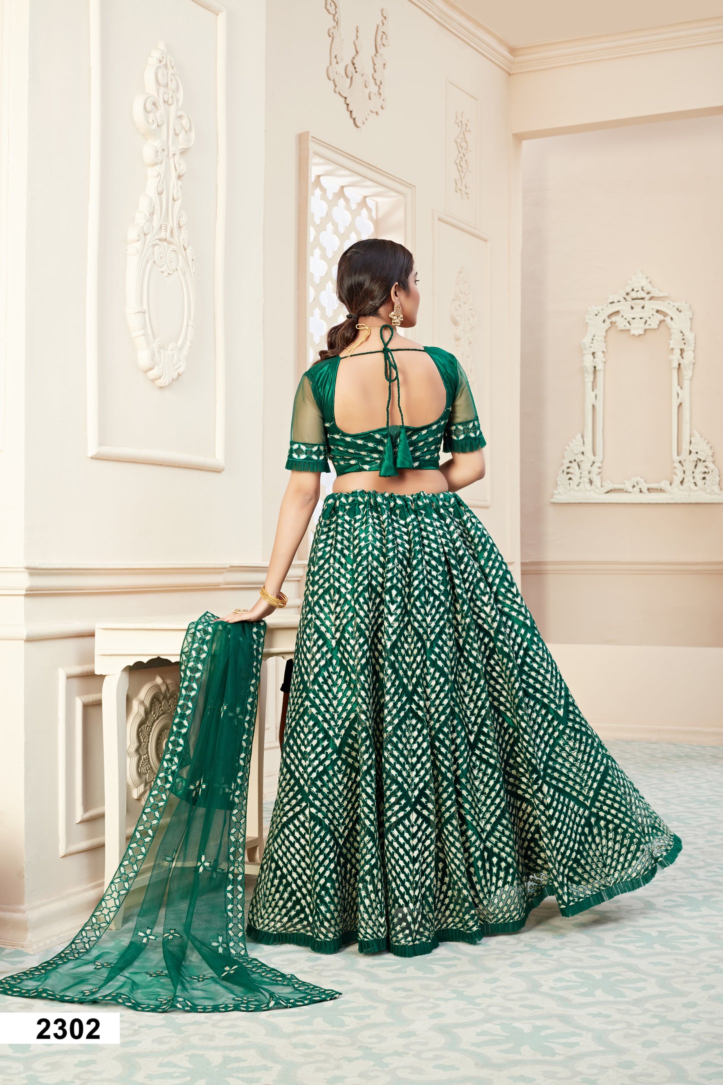 Elegant Green Soft Net Lehenga Choli with Badla Thread Work