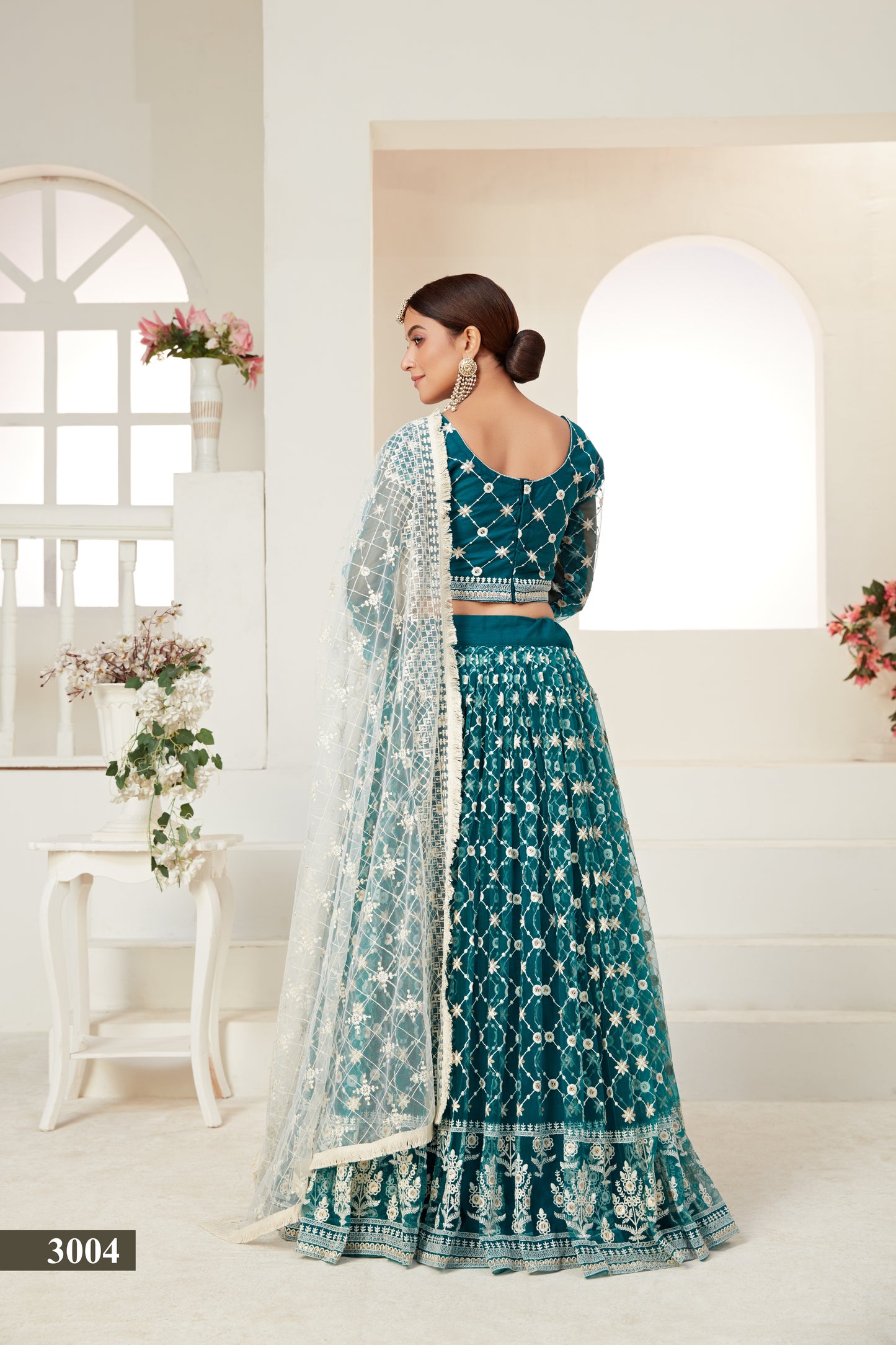 Elegant Teal Butterfly Net Lehenga Blouse Set with Multi and Sequin Work