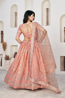 Chic Peach Dola Jacquard Lehenga with Zari & Sequin Work