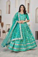 Elegant Cyan Green Dola Jacquard Lehenga with Zari & Sequin Work
